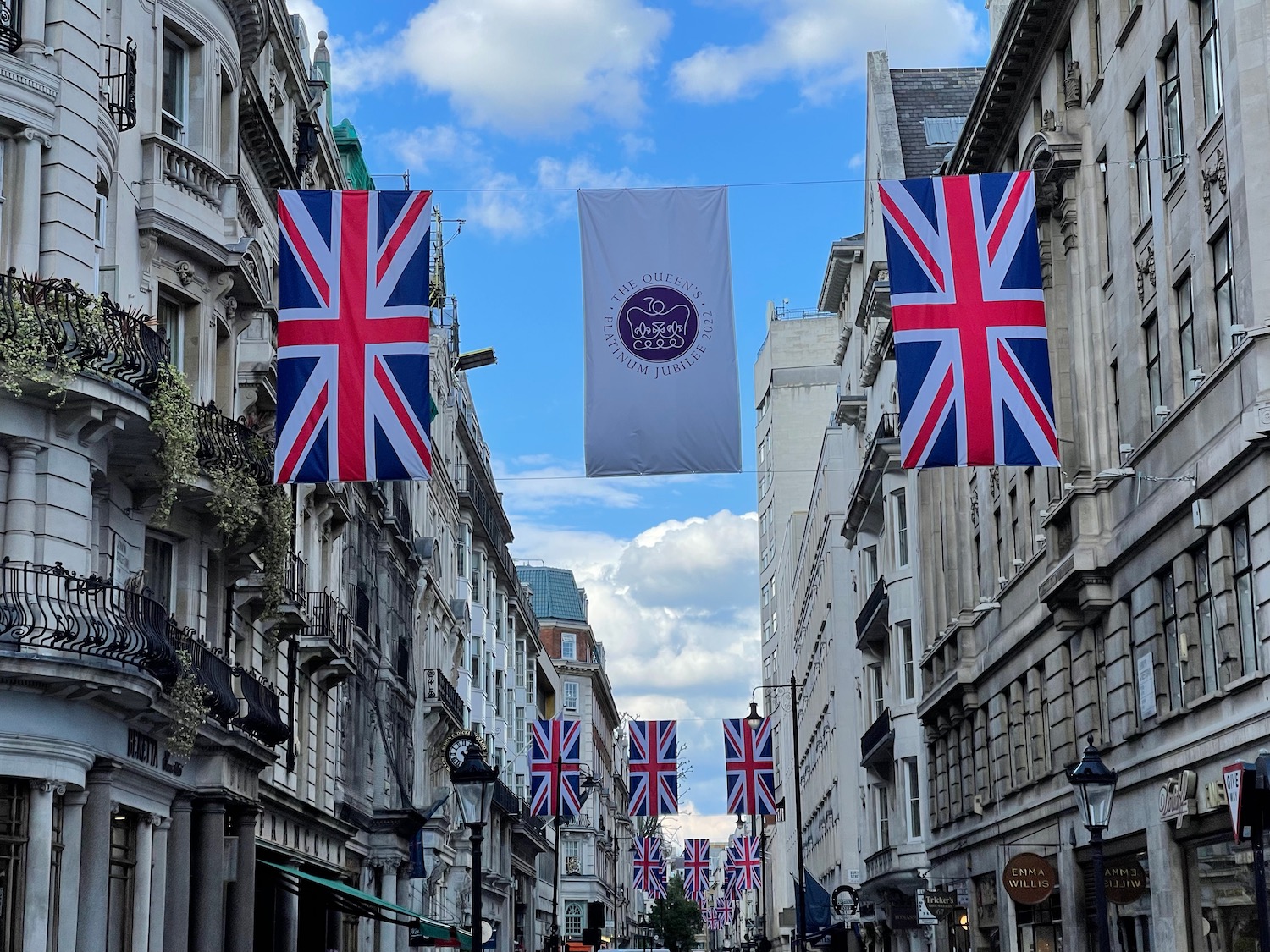 a street with flags from the wire