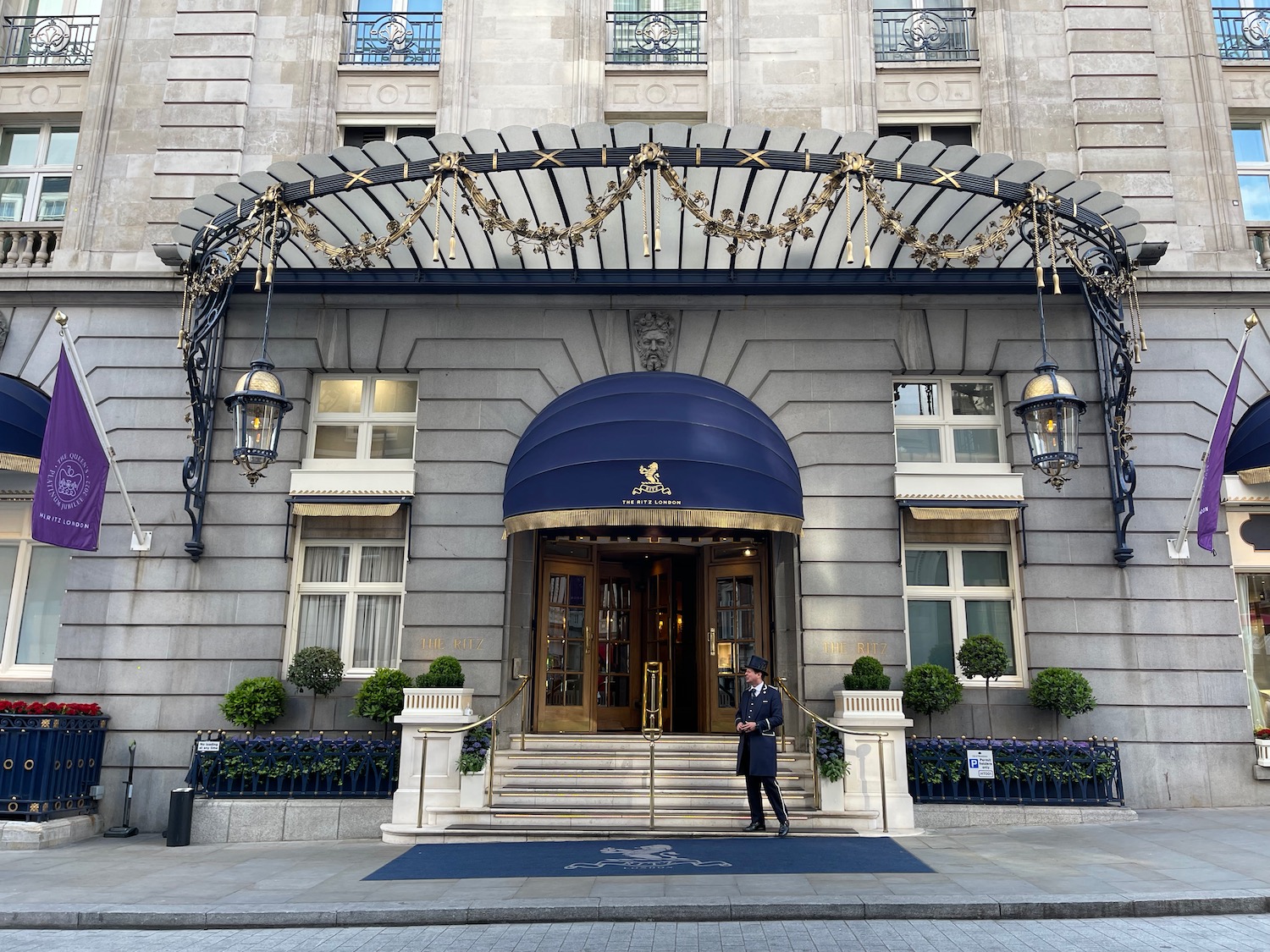 a man standing in front of a building