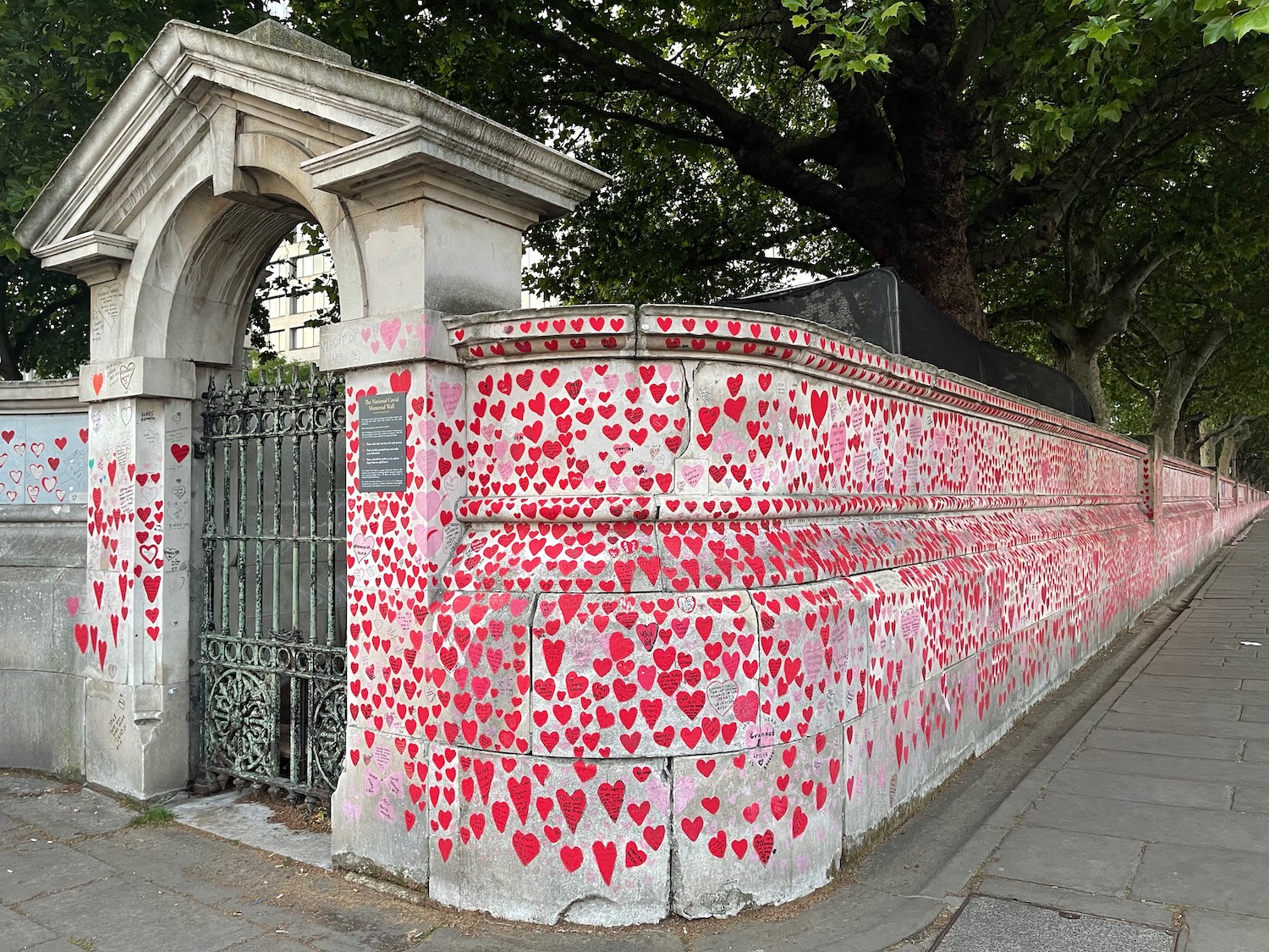 a wall with red hearts on it