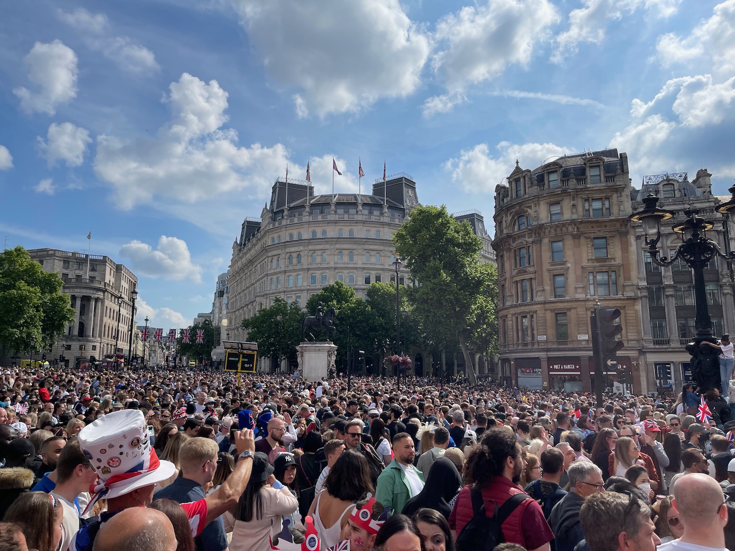 a large crowd of people in a city