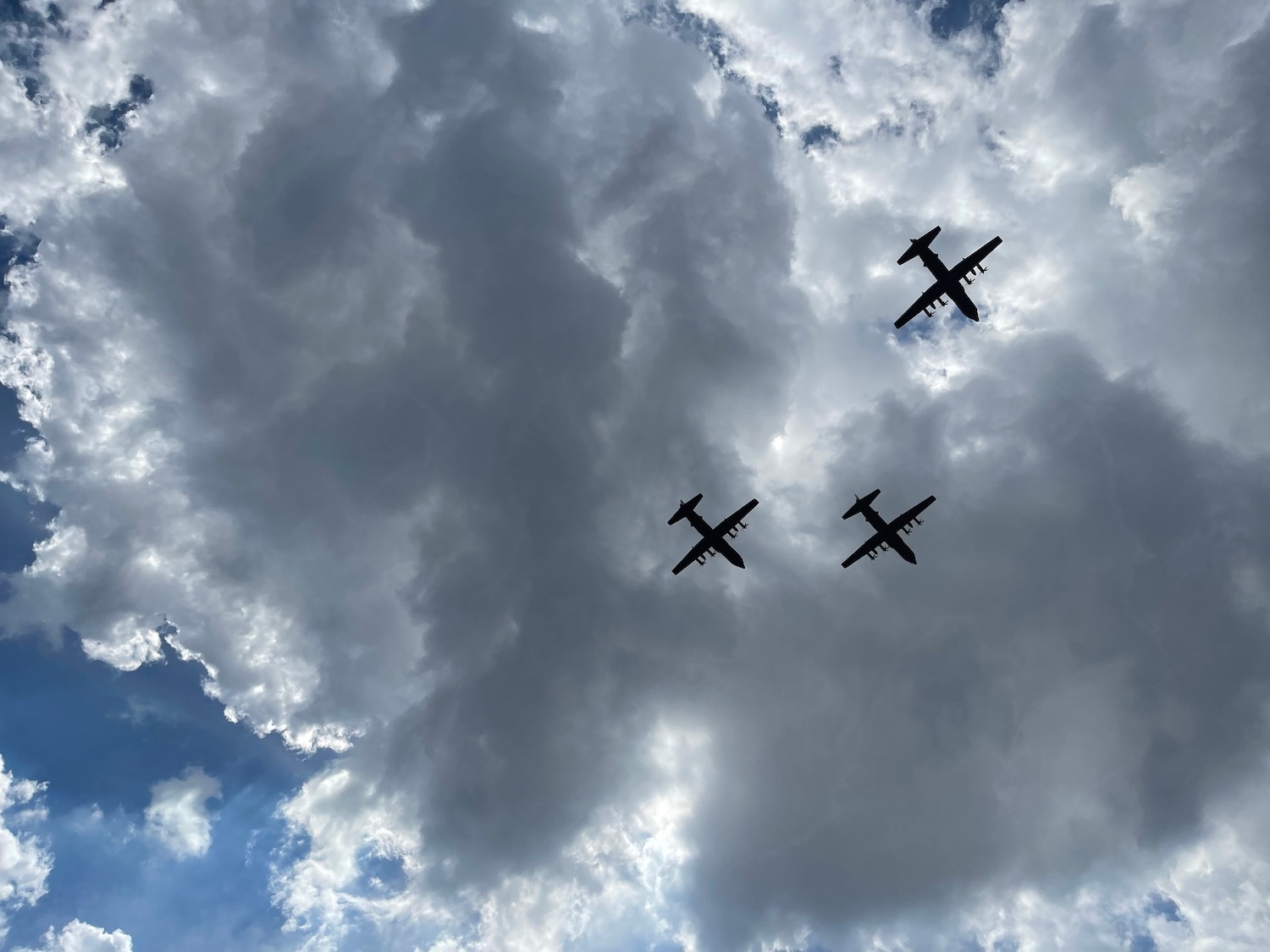 a group of airplanes flying in the sky