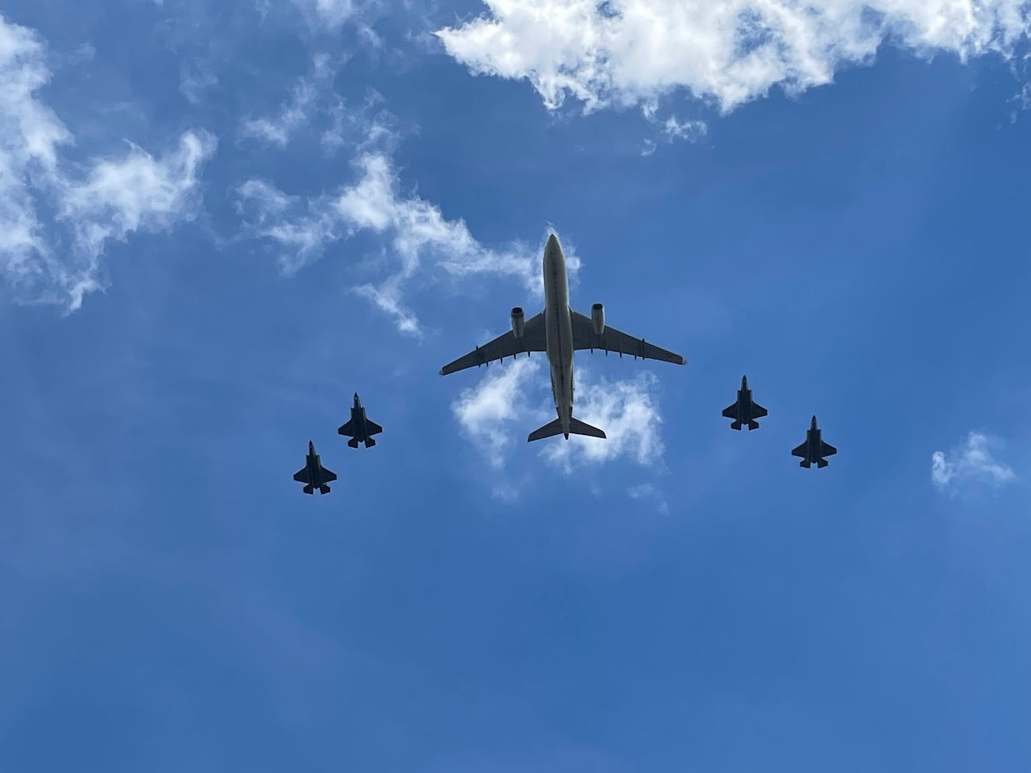 a group of airplanes in the sky