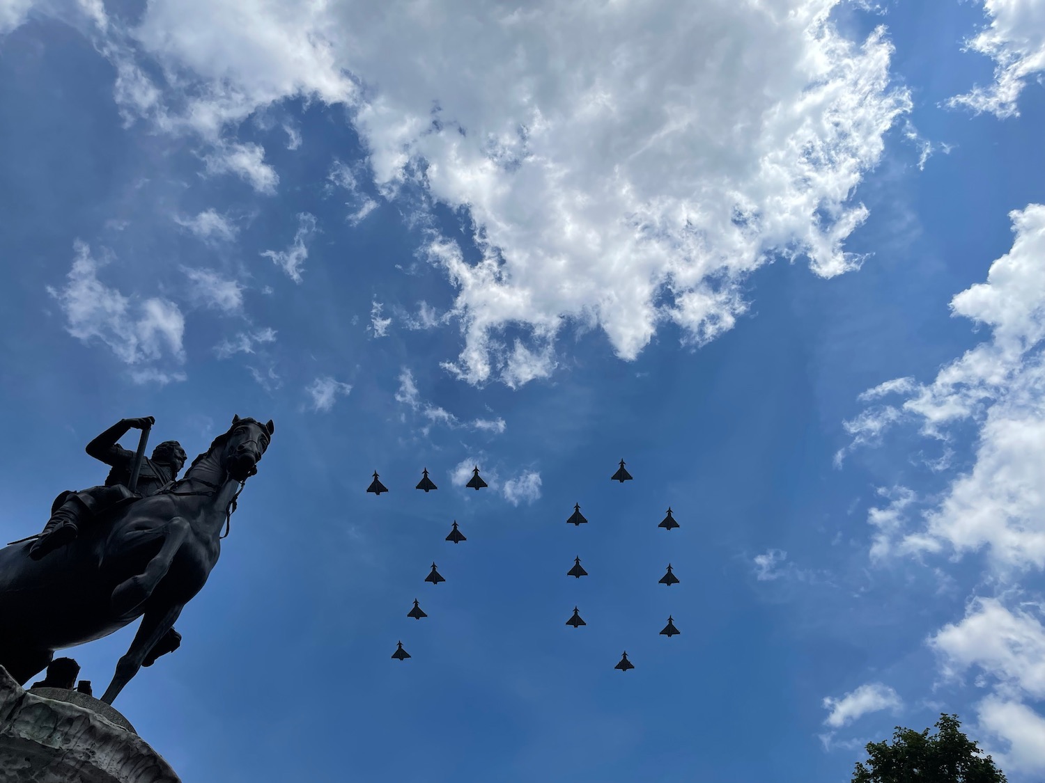 a group of jets flying in the sky