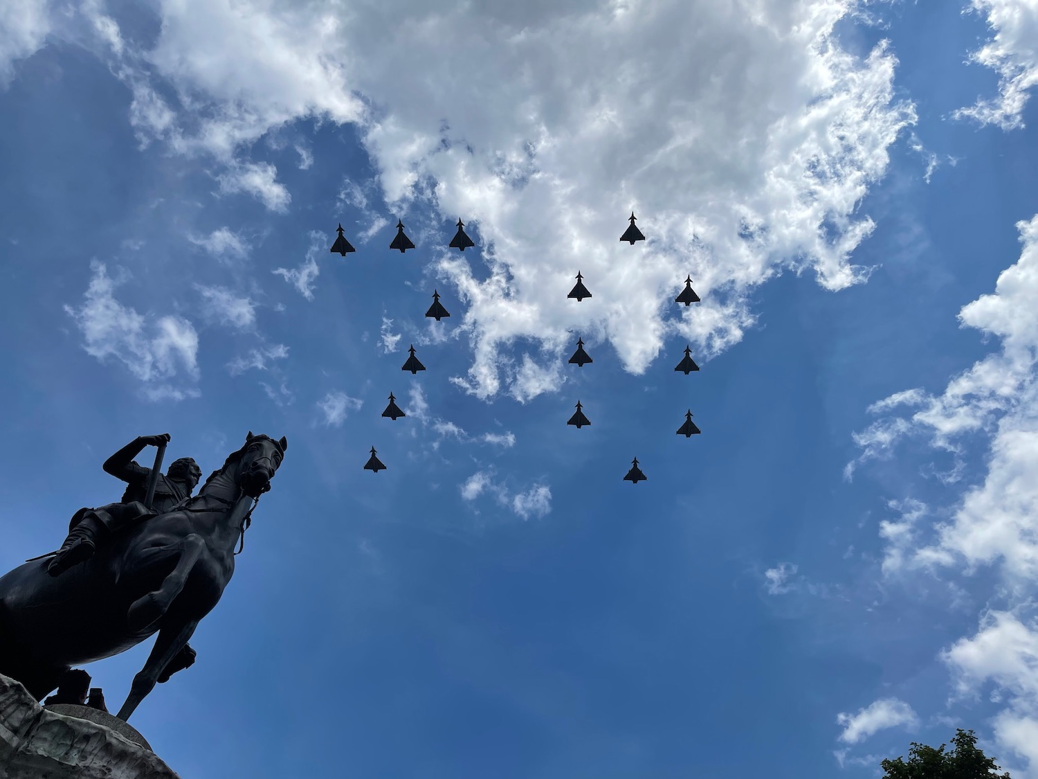 a group of jets flying in the sky