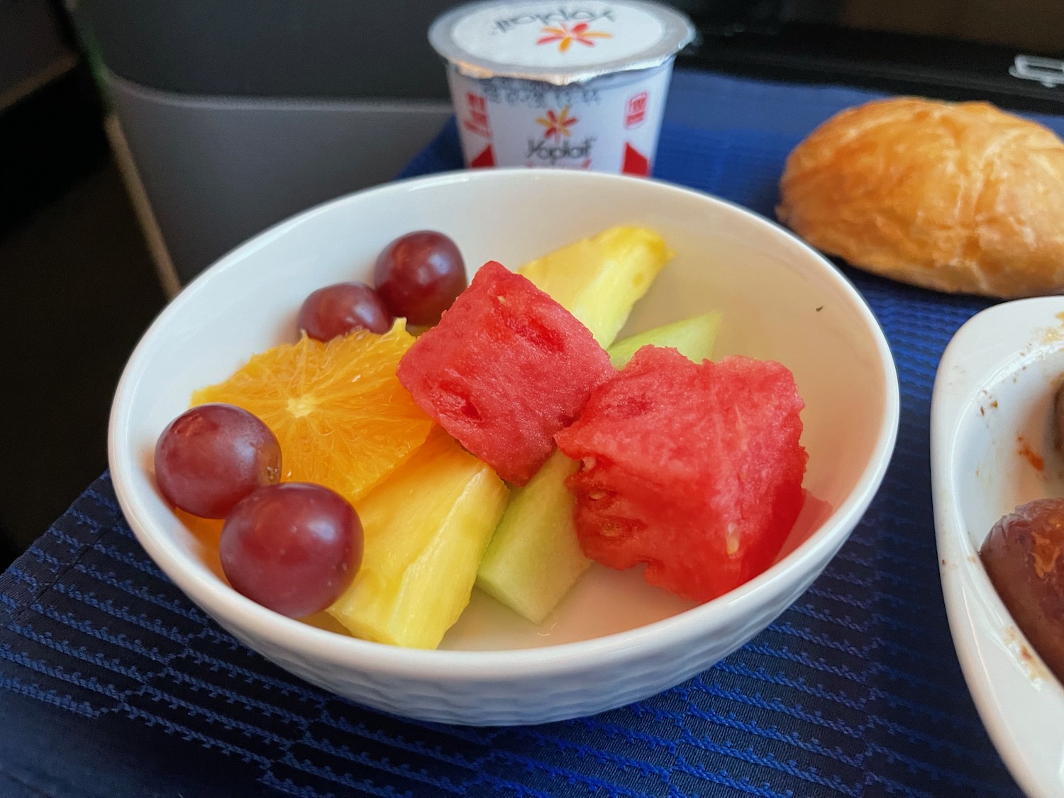 a bowl of fruit and yogurt