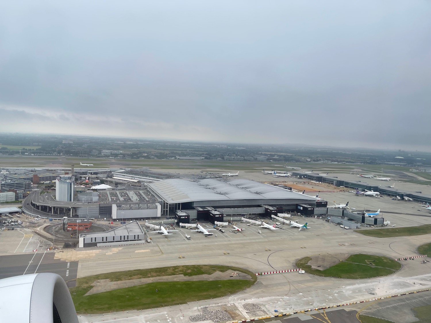 an airport with planes on the ground