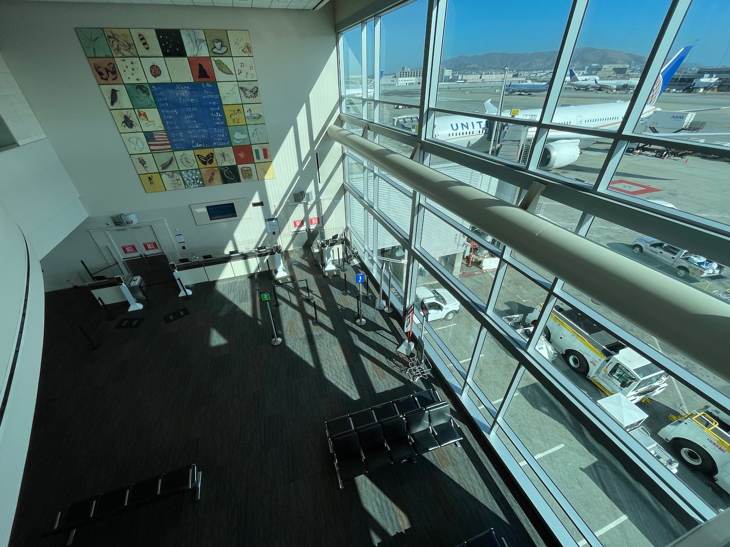 an airport terminal with a large window