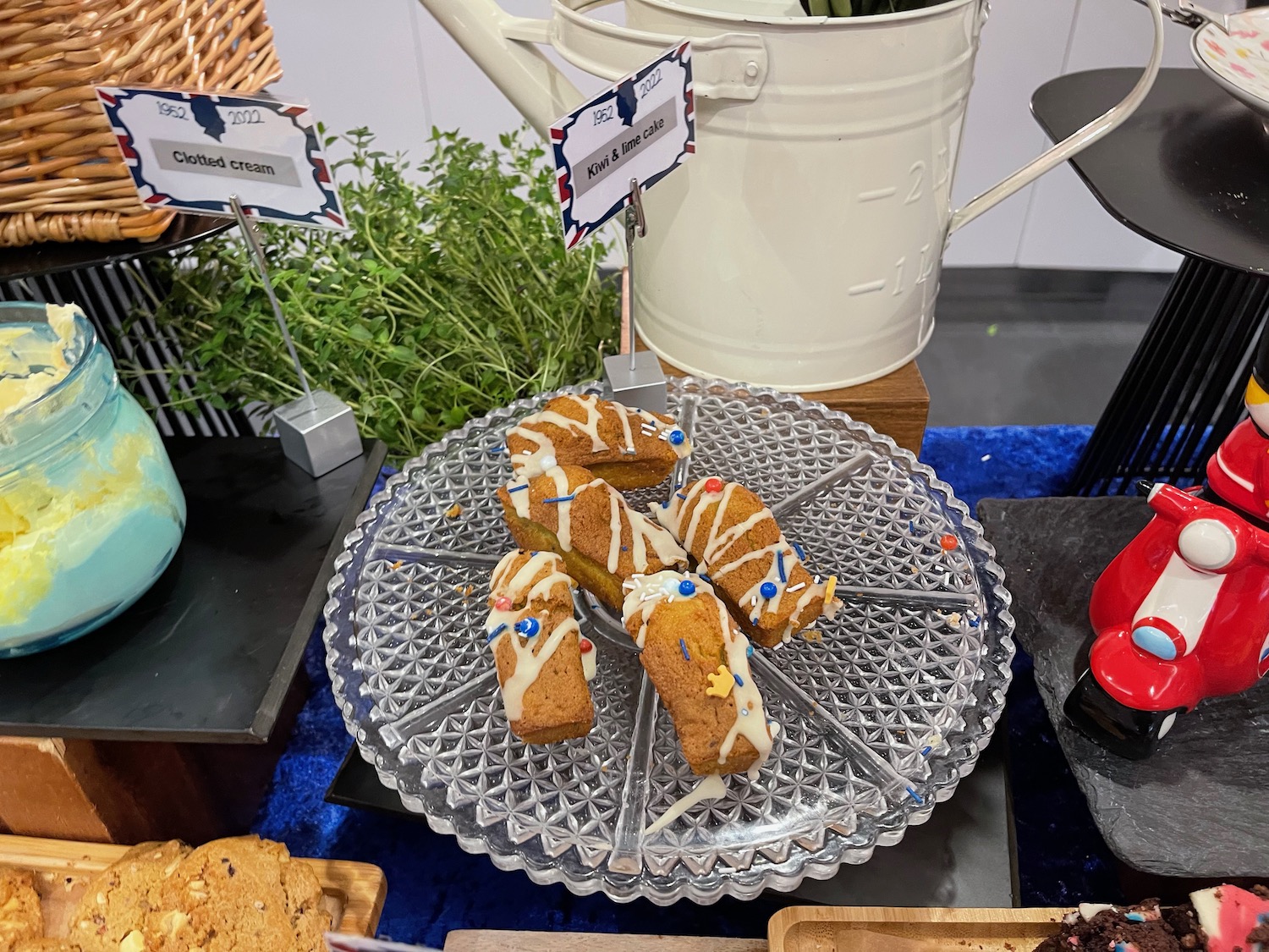 a plate of cookies with white frosting