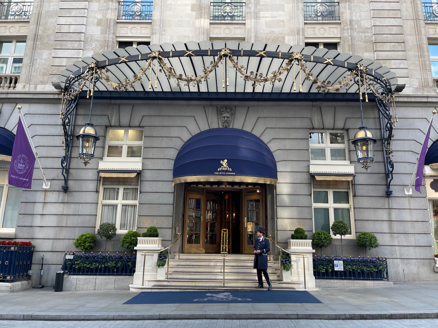 a man standing in front of a building