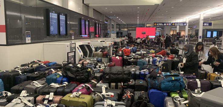 a group of luggage in a terminal