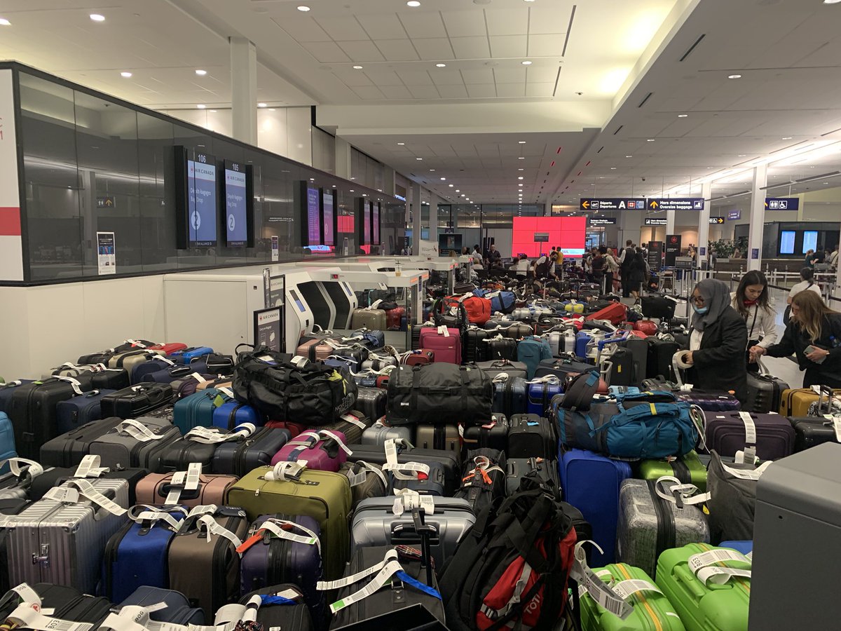 a group of luggage in a terminal