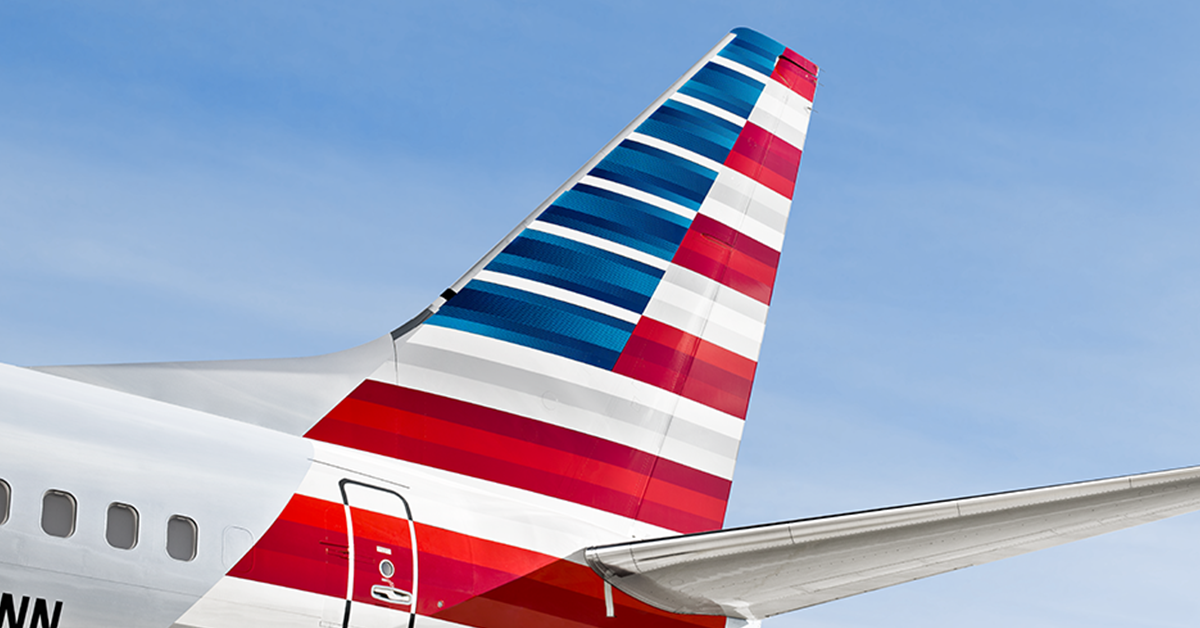 the tail of an airplane with stripes on it