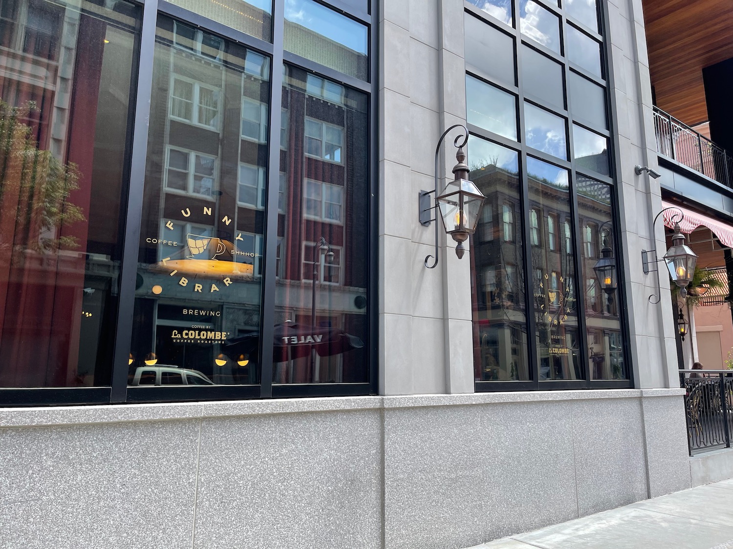 a building with windows and a street light