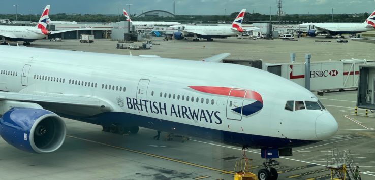 a large white airplane at an airport