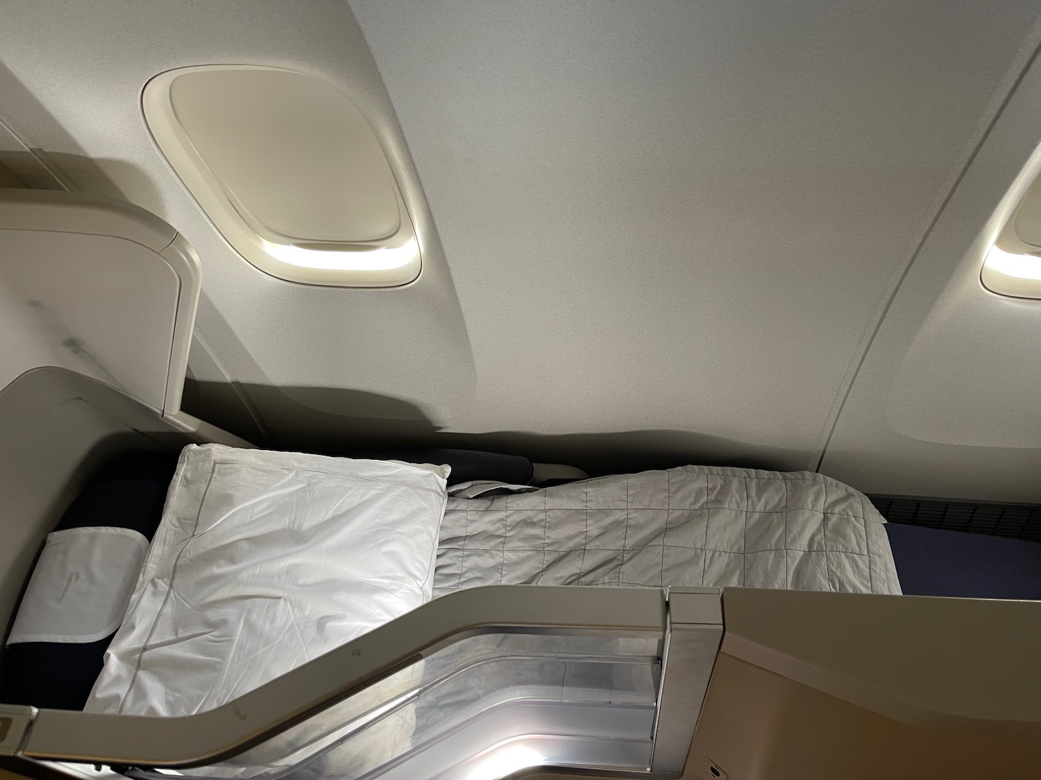 an airplane with an escalator and a bed
