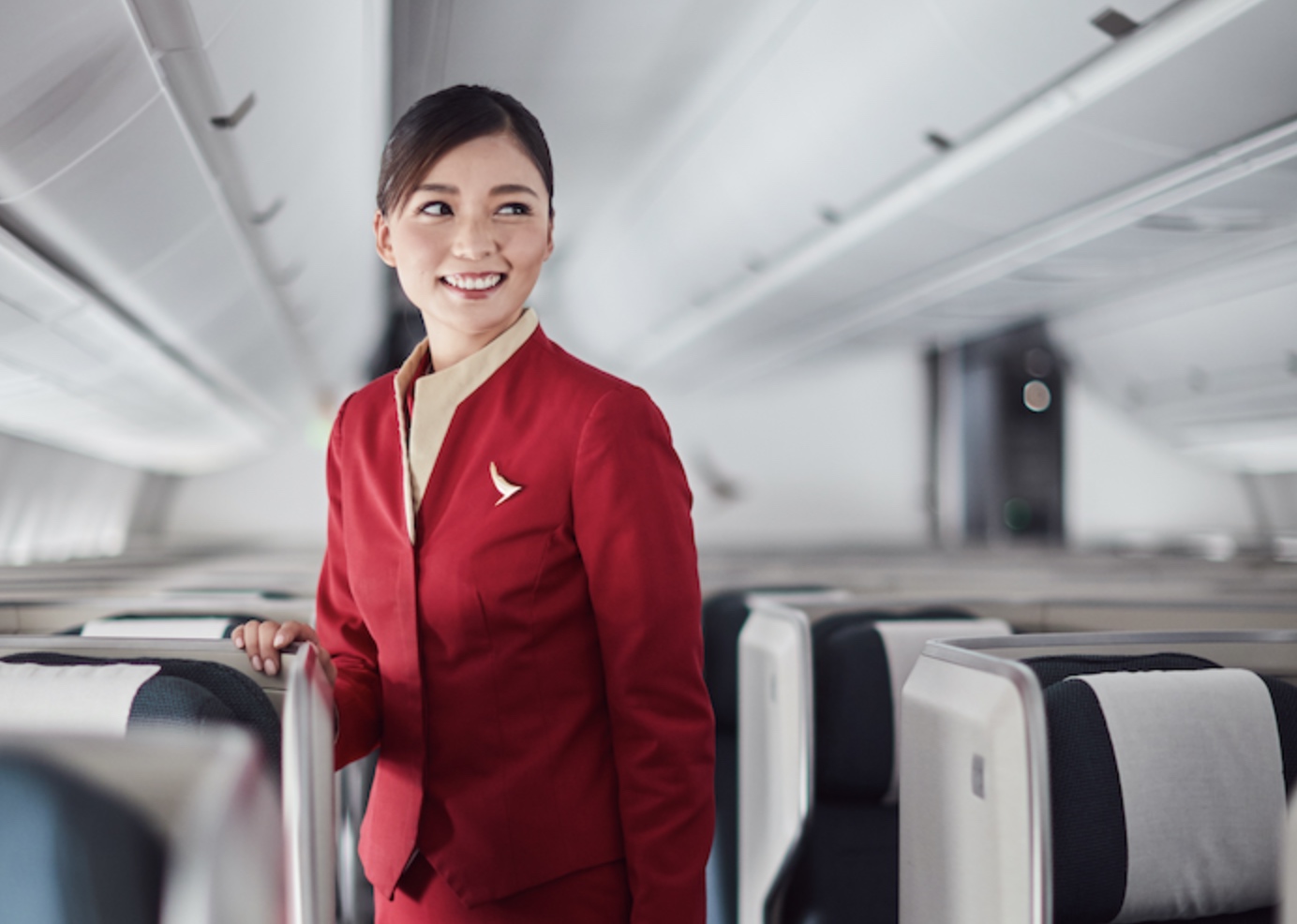 a woman in a red uniform