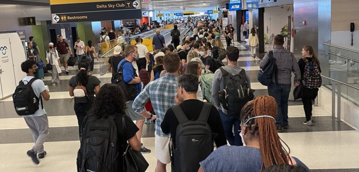 a group of people in a terminal