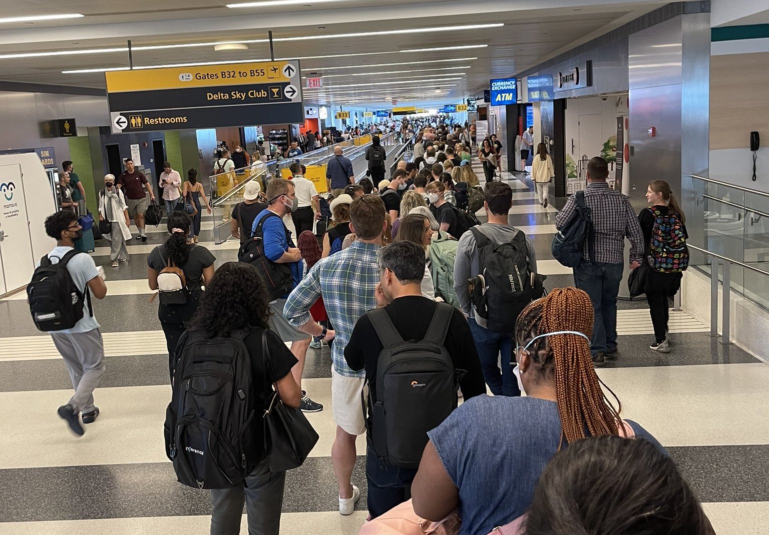 a group of people in a terminal