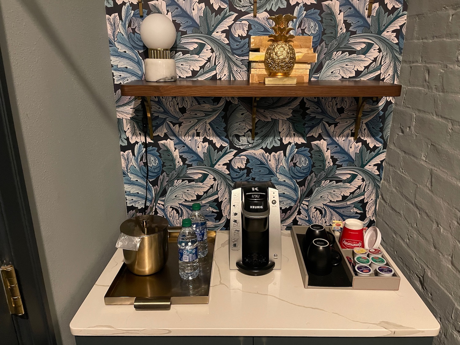 a coffee machine and coffee cups on a counter