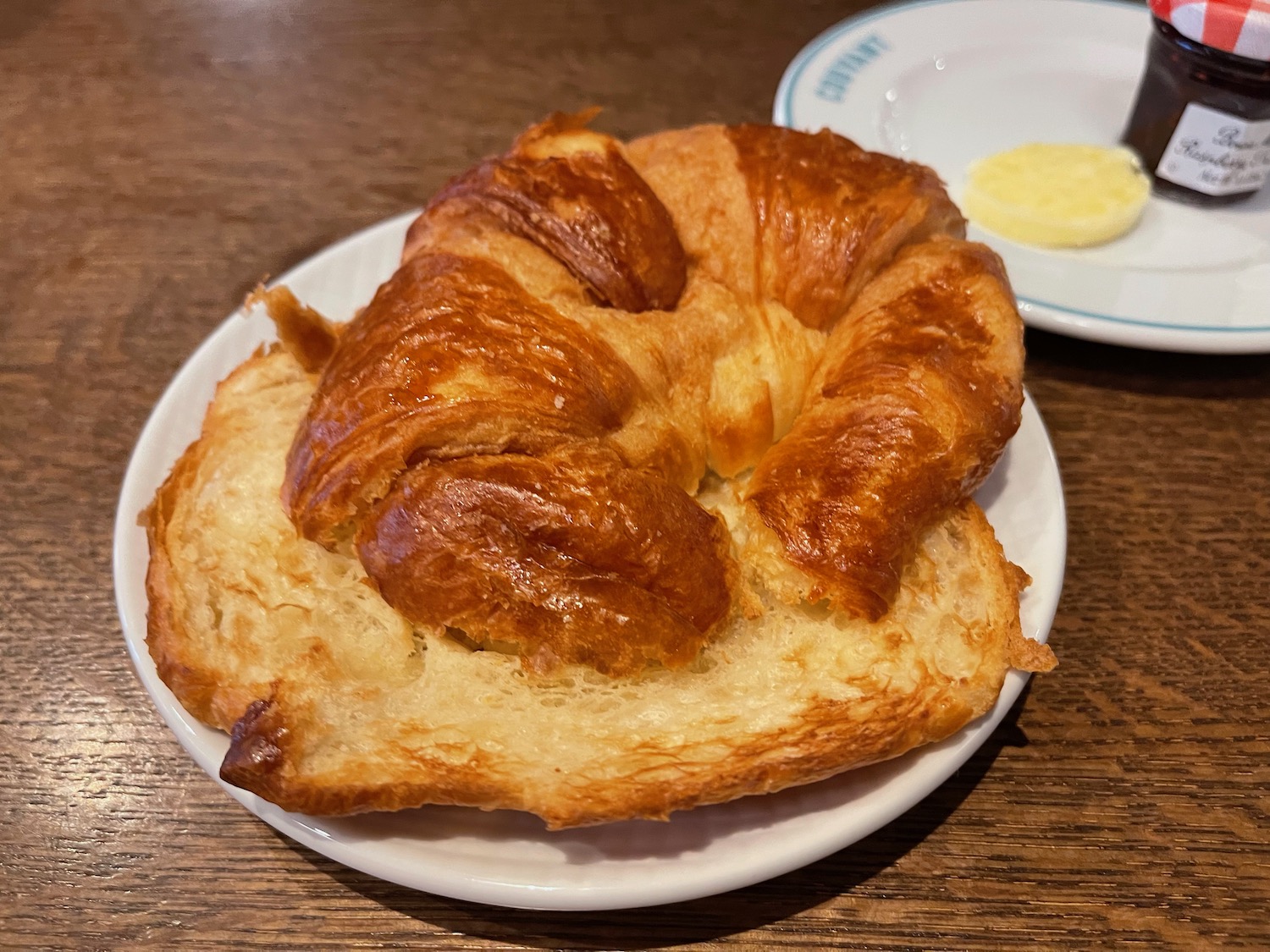 a croissant on a plate