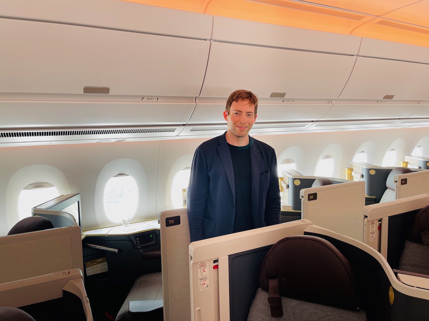 a man standing in an airplane