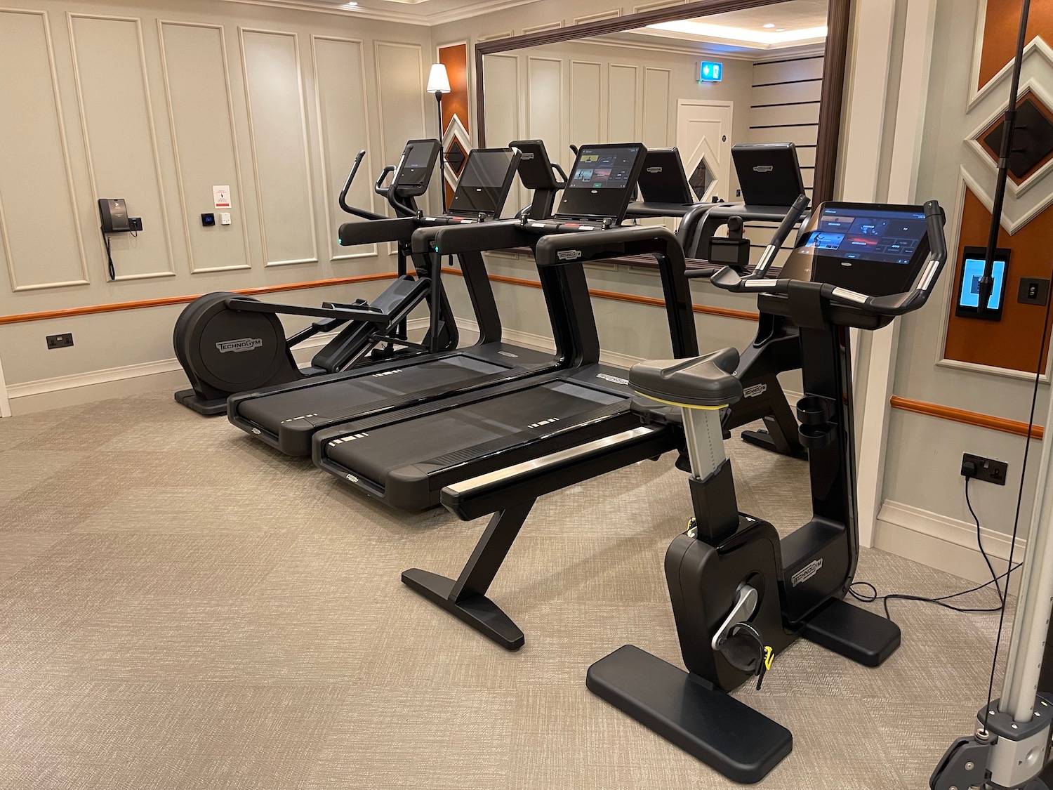 a group of treadmills in a room