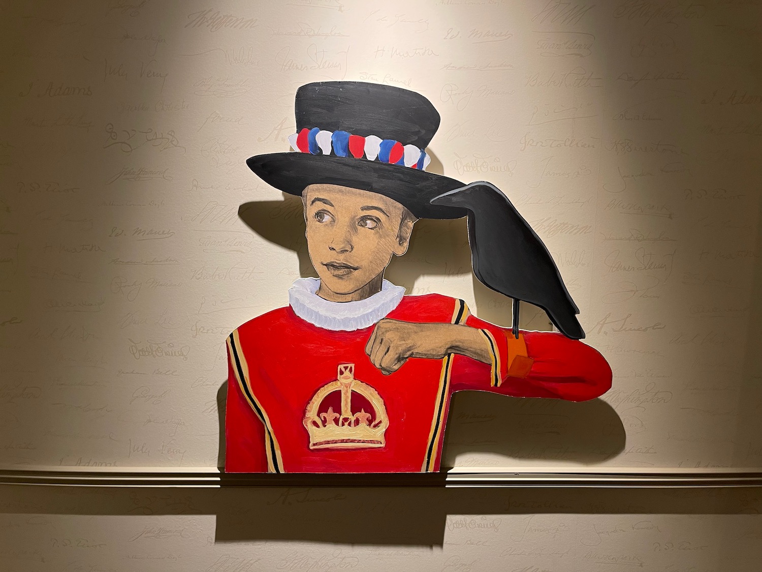 a painting of a boy in a red shirt and a black hat