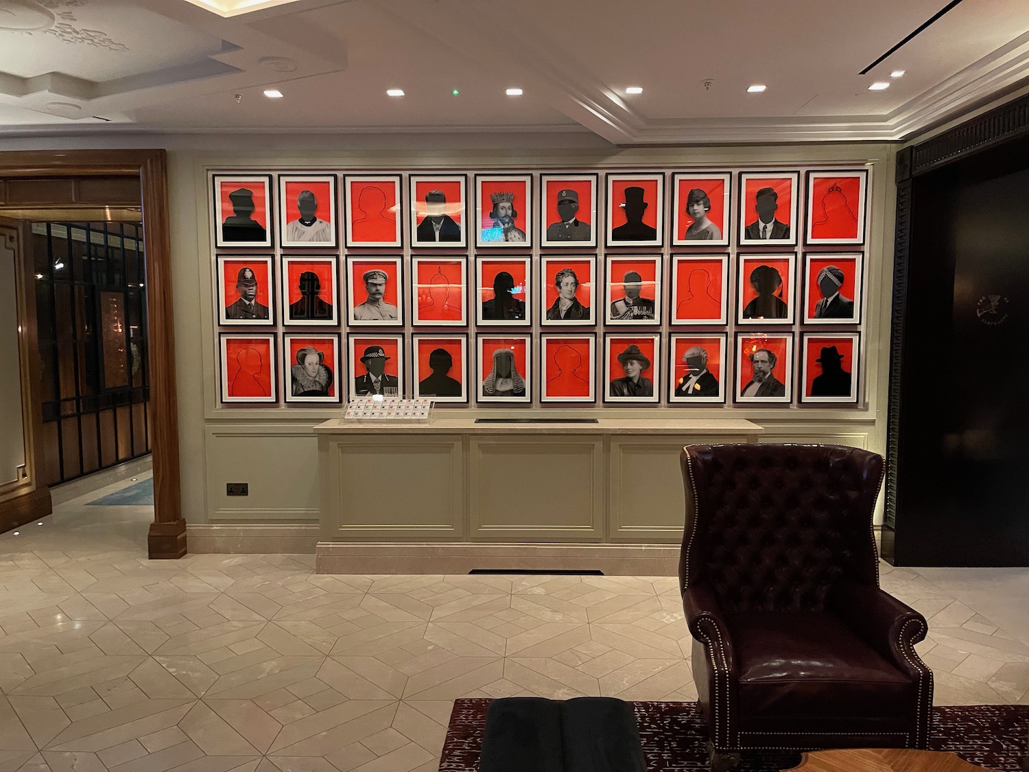 a wall with pictures of people on it