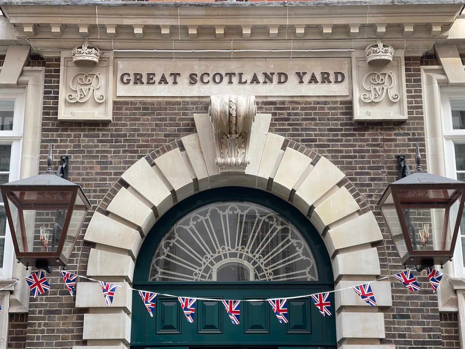 a building with flags on the front