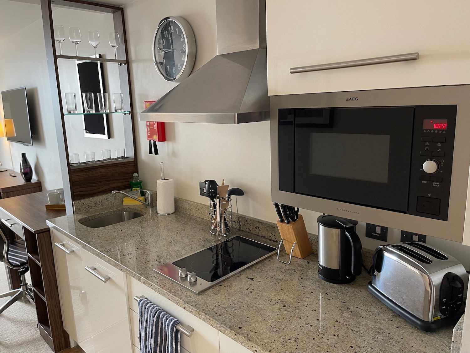 a kitchen with a microwave oven and toaster oven