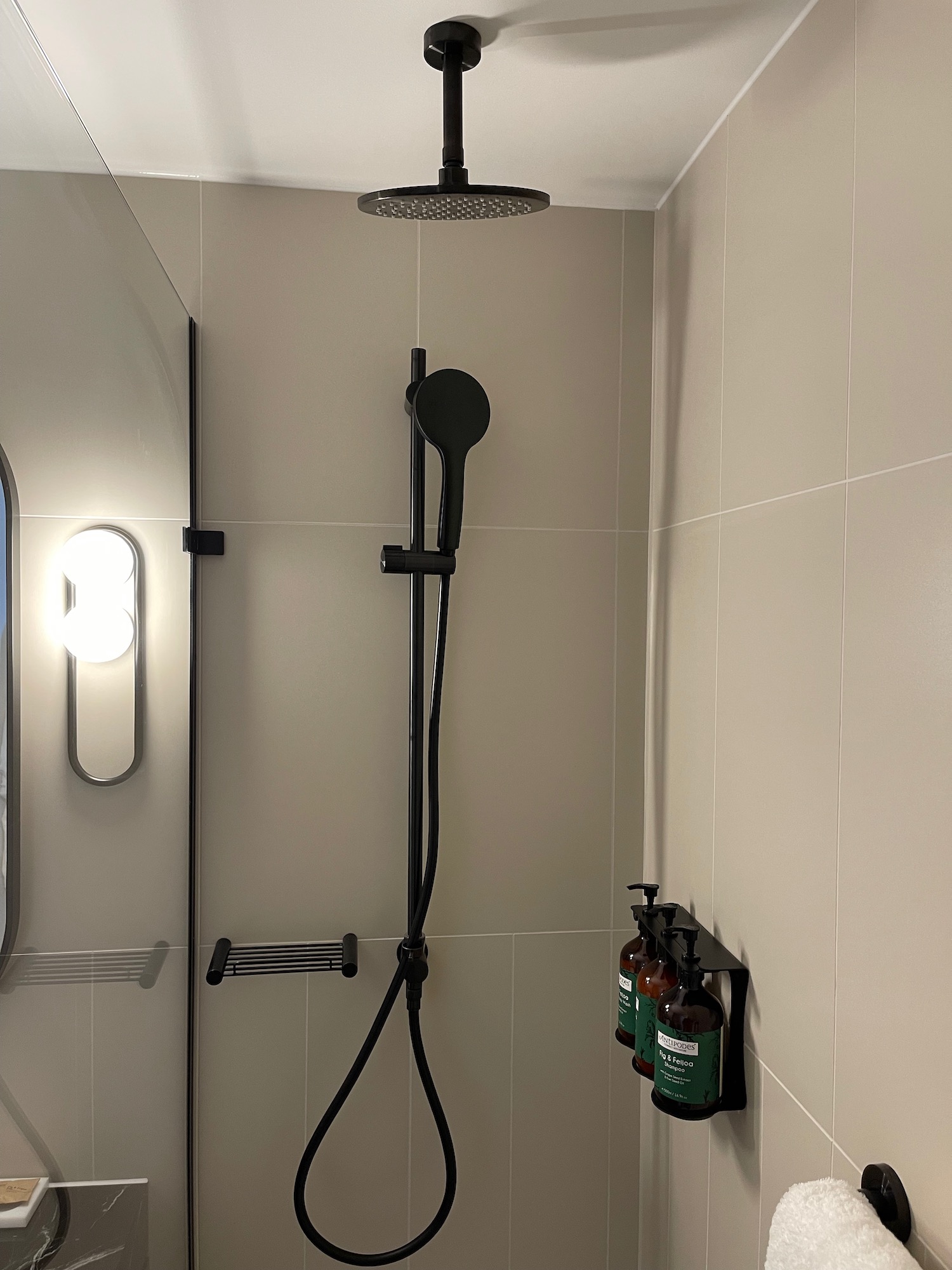 a shower head in a bathroom