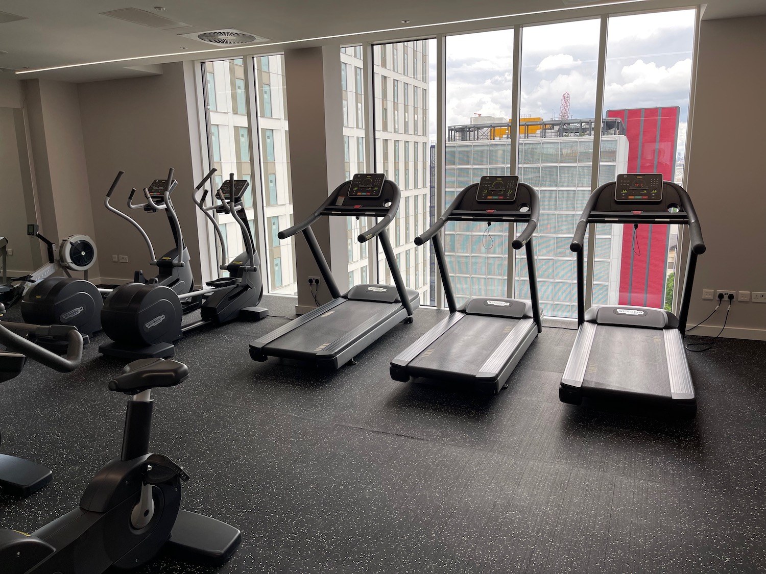 a room with treadmills and exercise machines