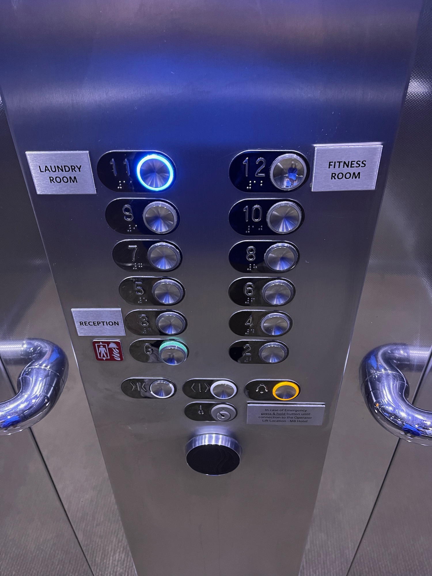 a elevator with buttons and handles