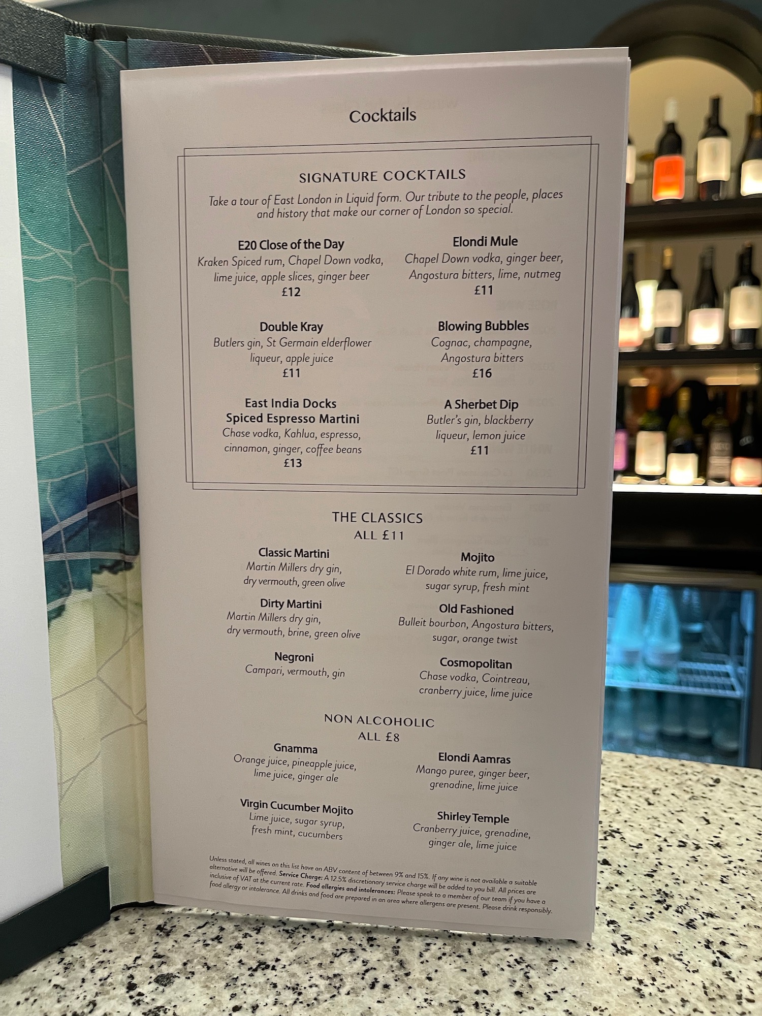 a menu on a counter