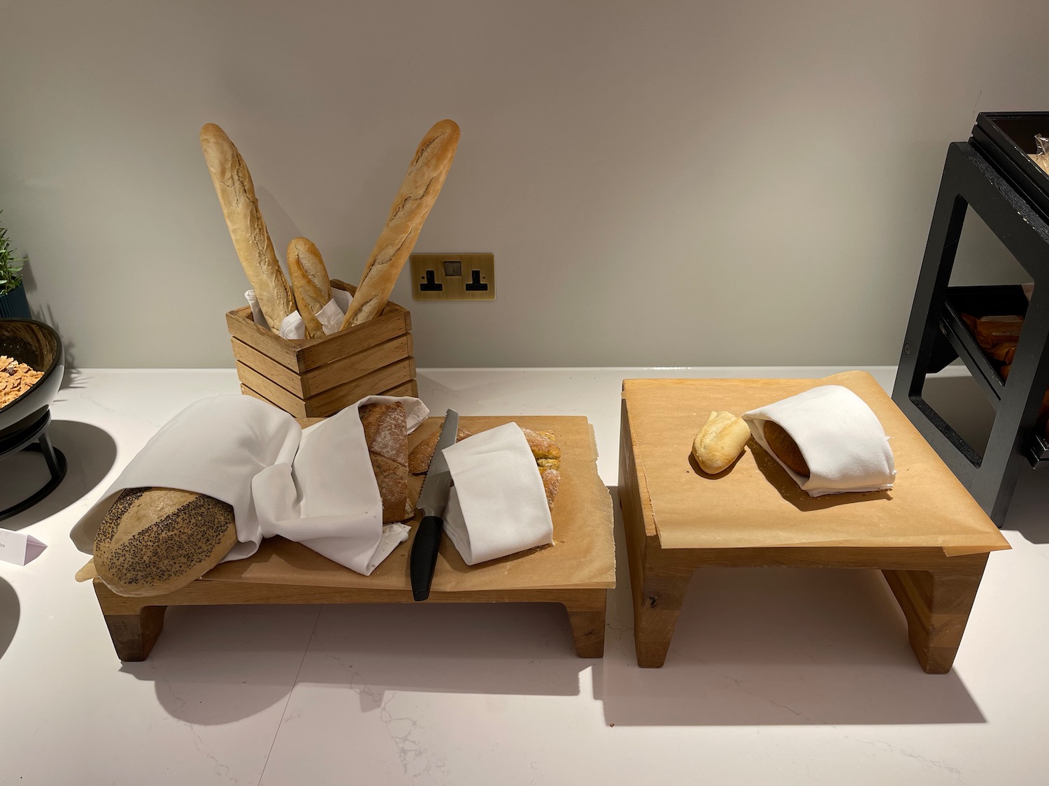 a table with bread in bags