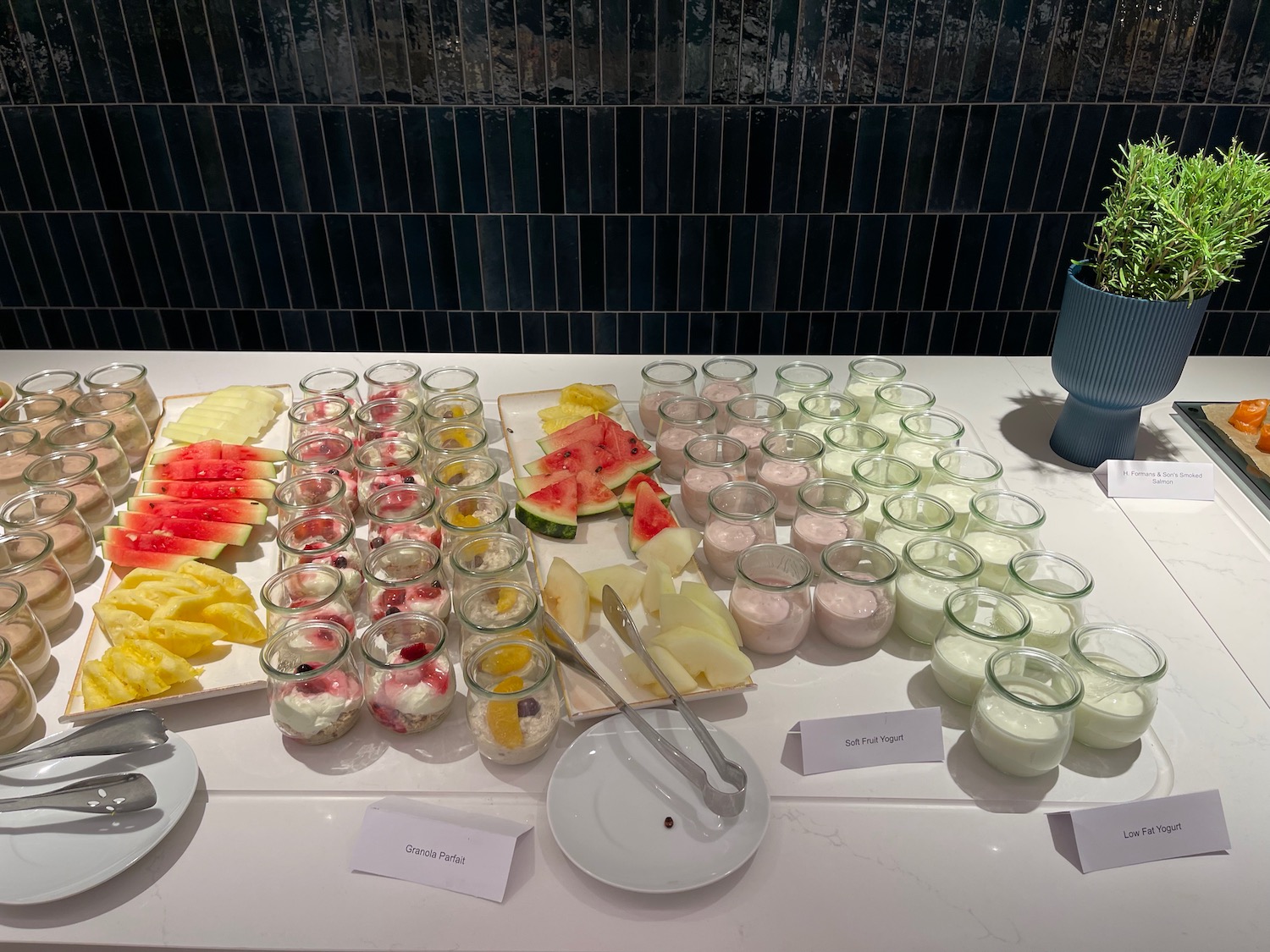 a table with fruit and yogurt