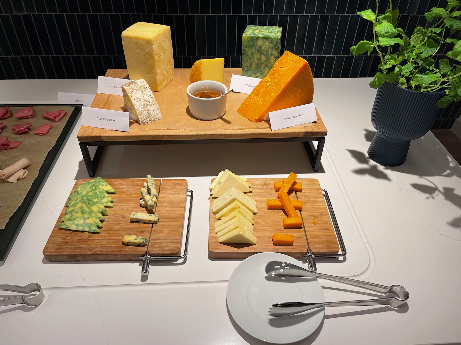 a table with different types of cheese on it