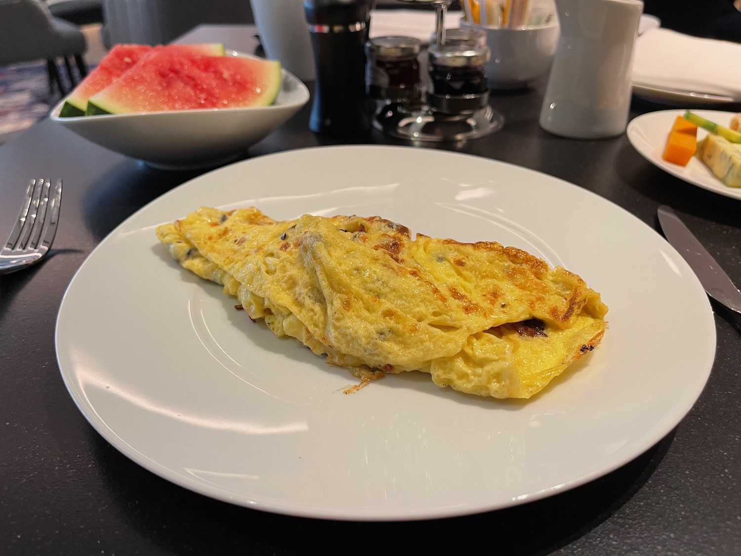 a plate of omelette on a table