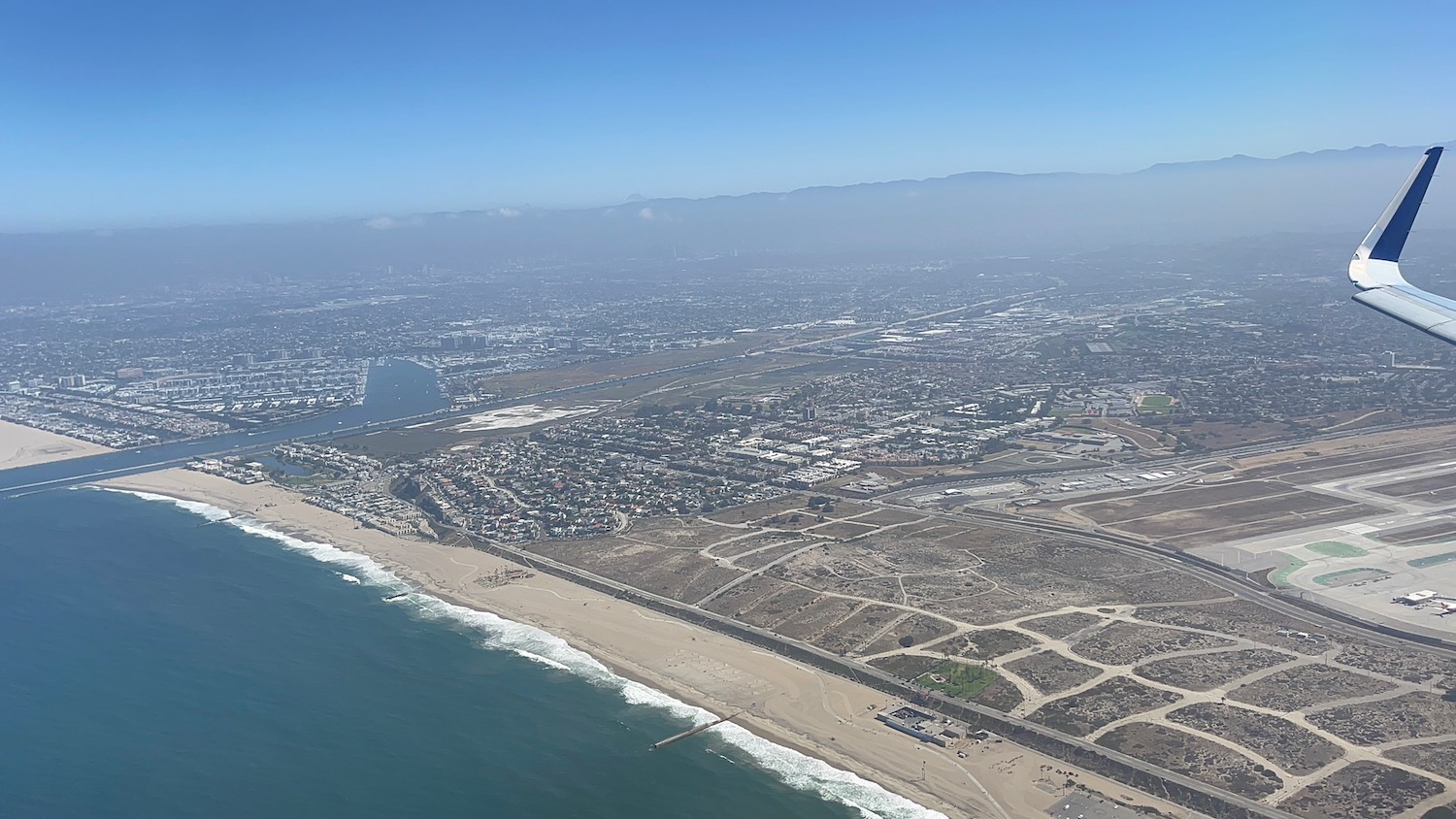 aerial view of a beach and a city