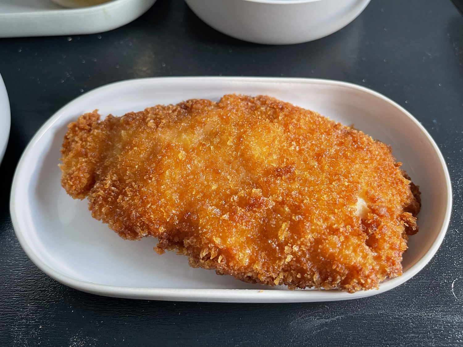 a fried chicken on a plate