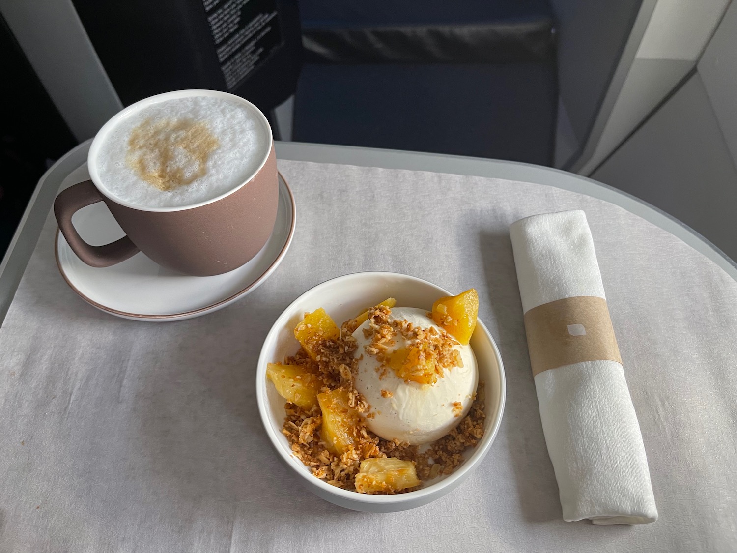 a bowl of ice cream and a cup of coffee