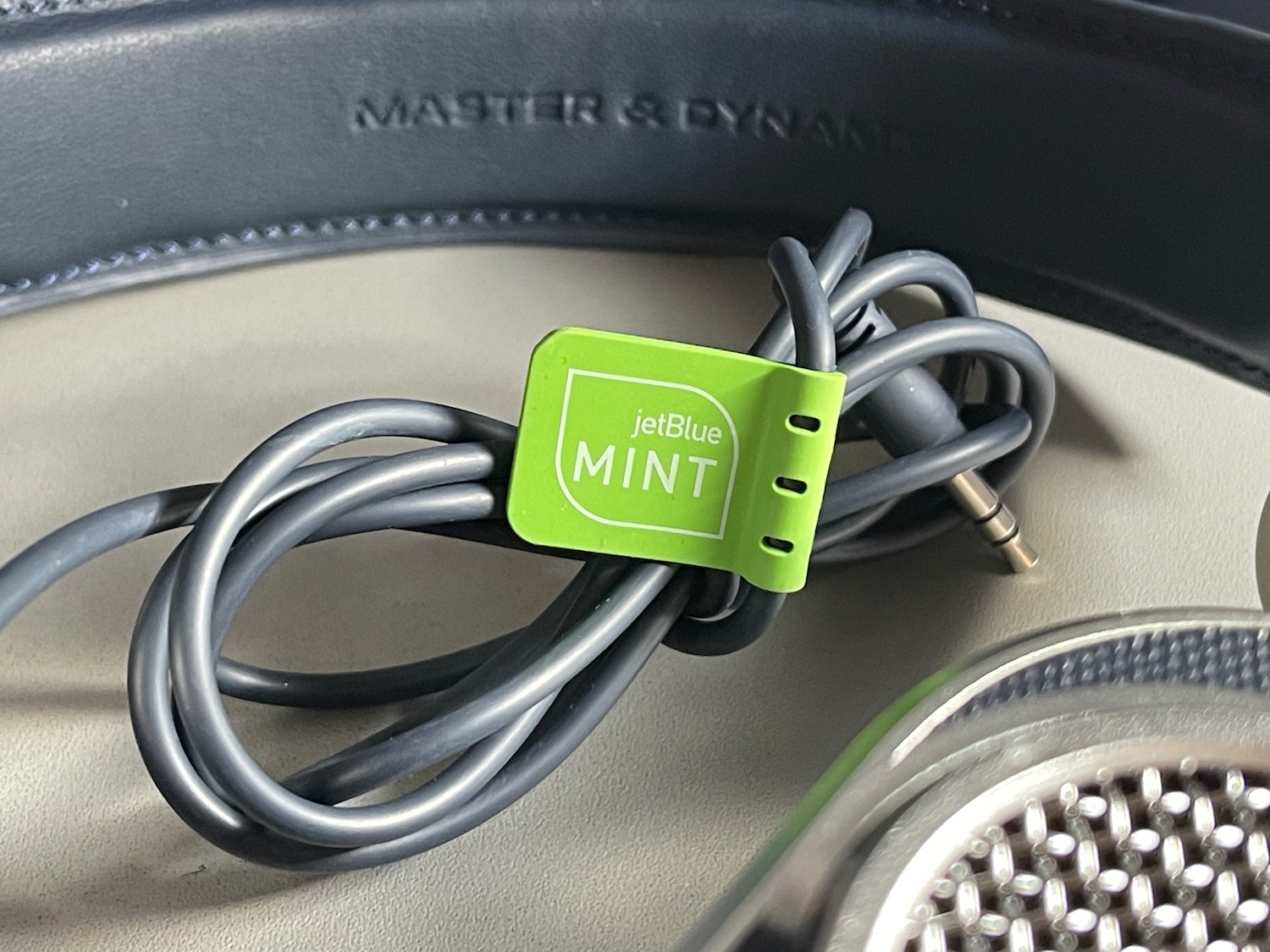 a headphones with a green cable