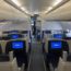 an airplane with seats and monitors