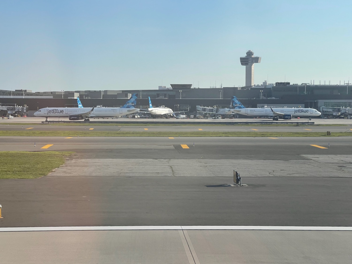 a runway with airplanes on it