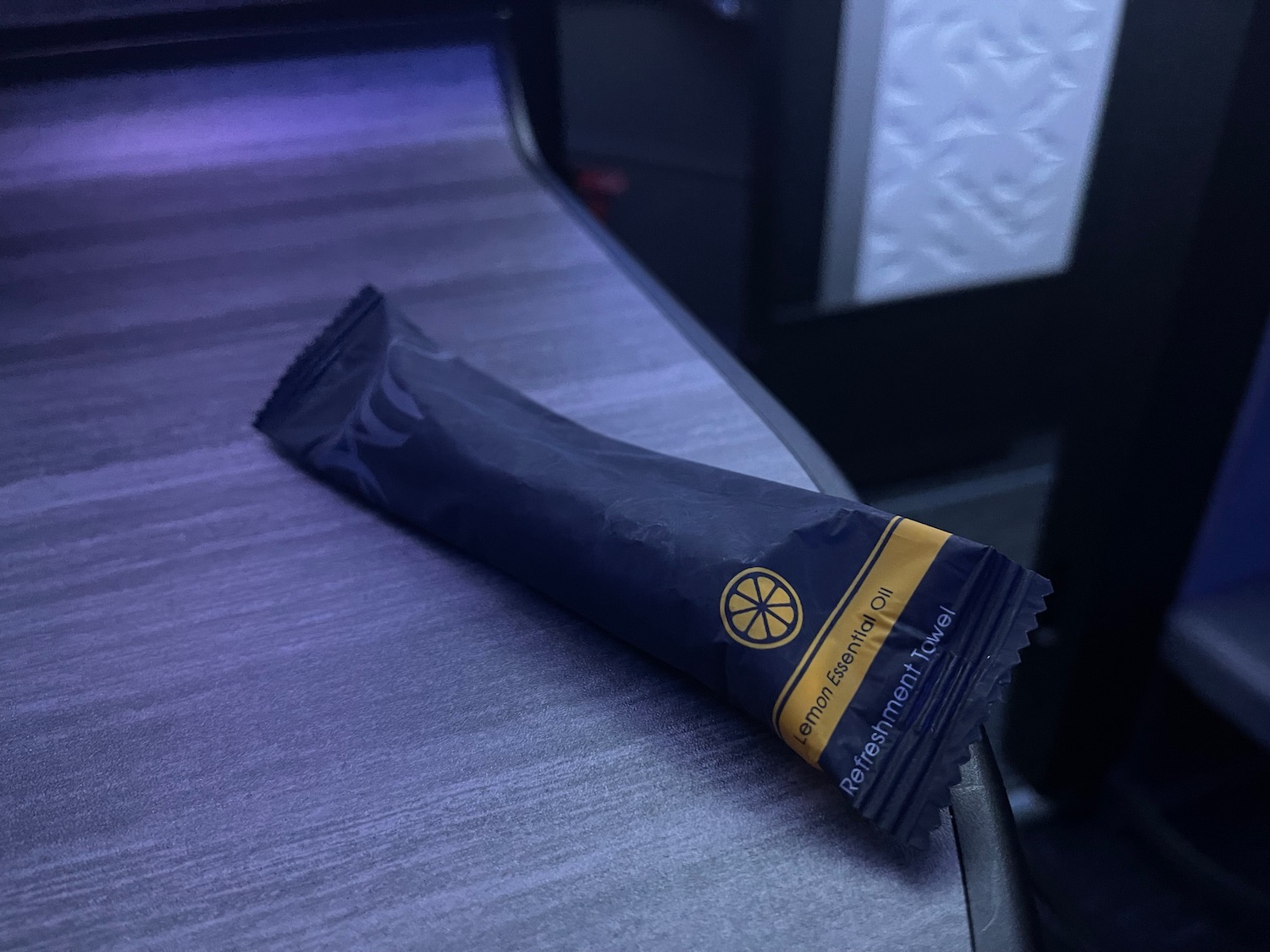 a small black and yellow packet on a table