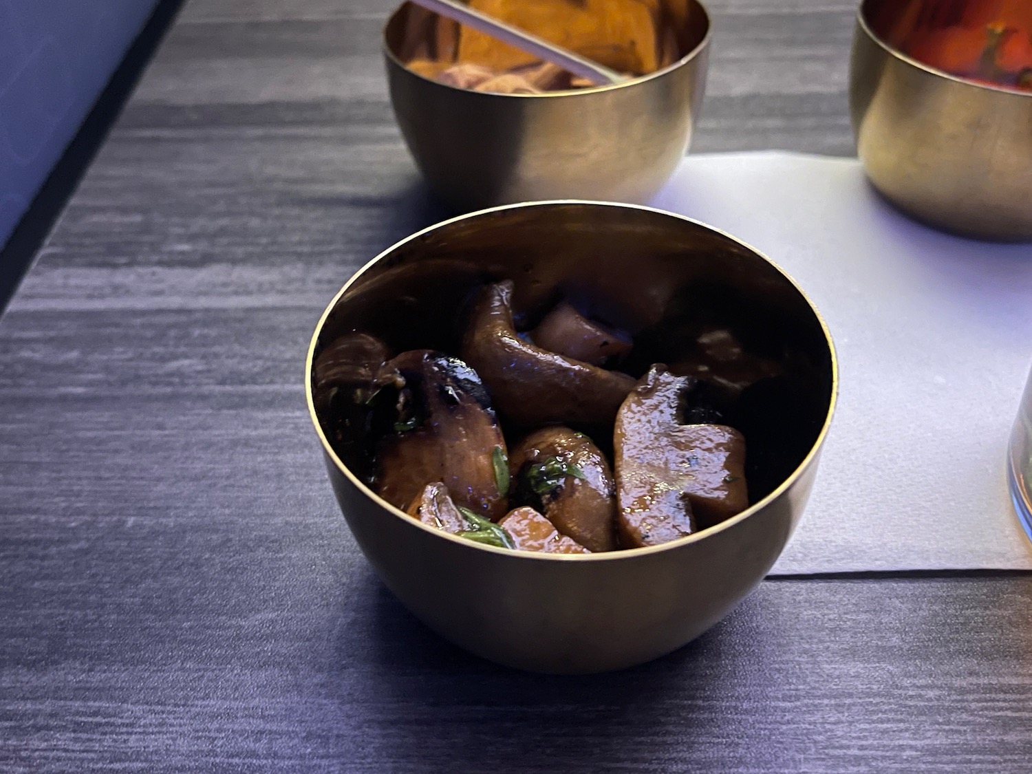 a bowl of mushrooms on a table