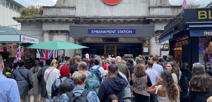 a crowd of people outside of a building