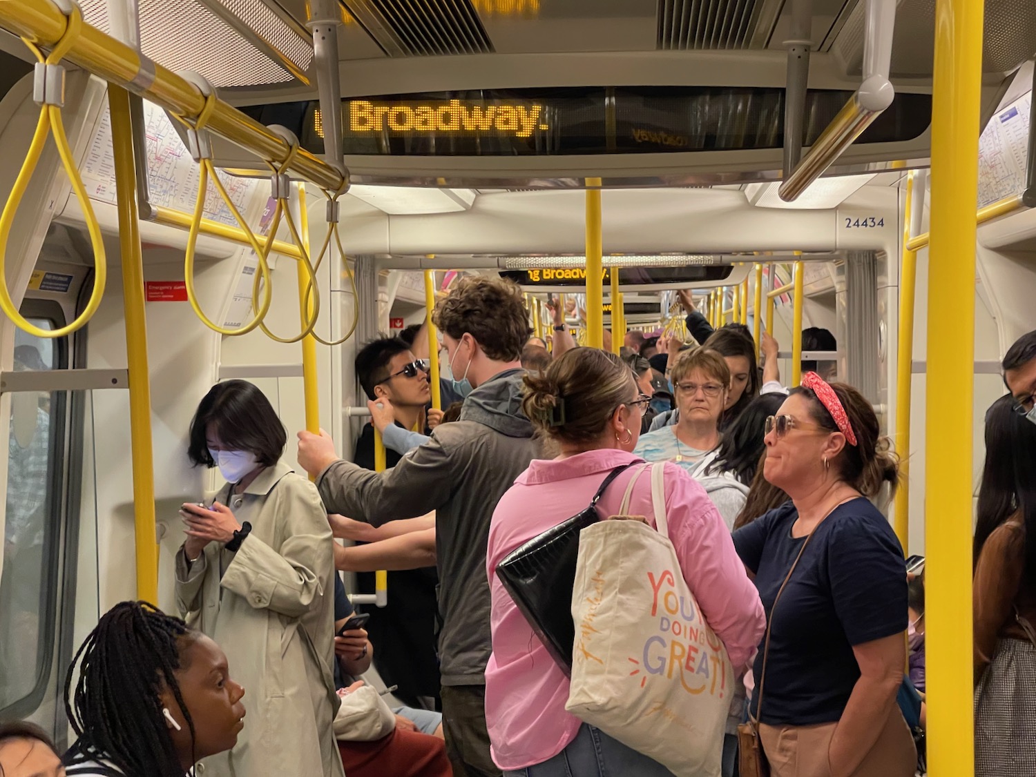 a group of people on a subway