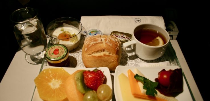 a tray of food and drinks on a table