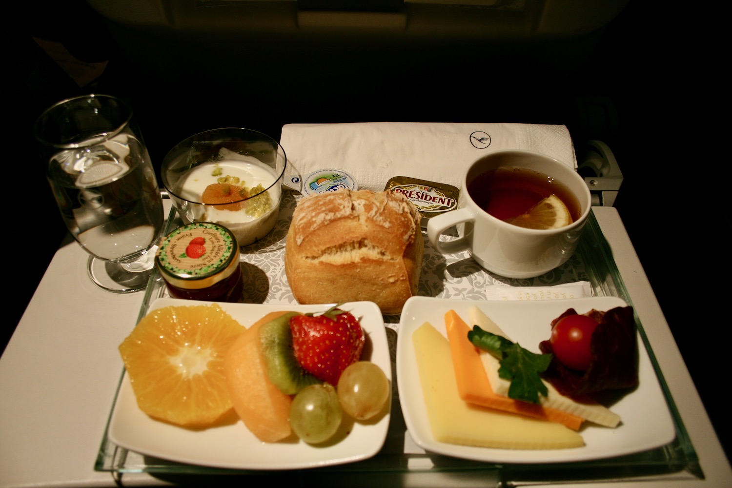 a tray of food and drinks on a table